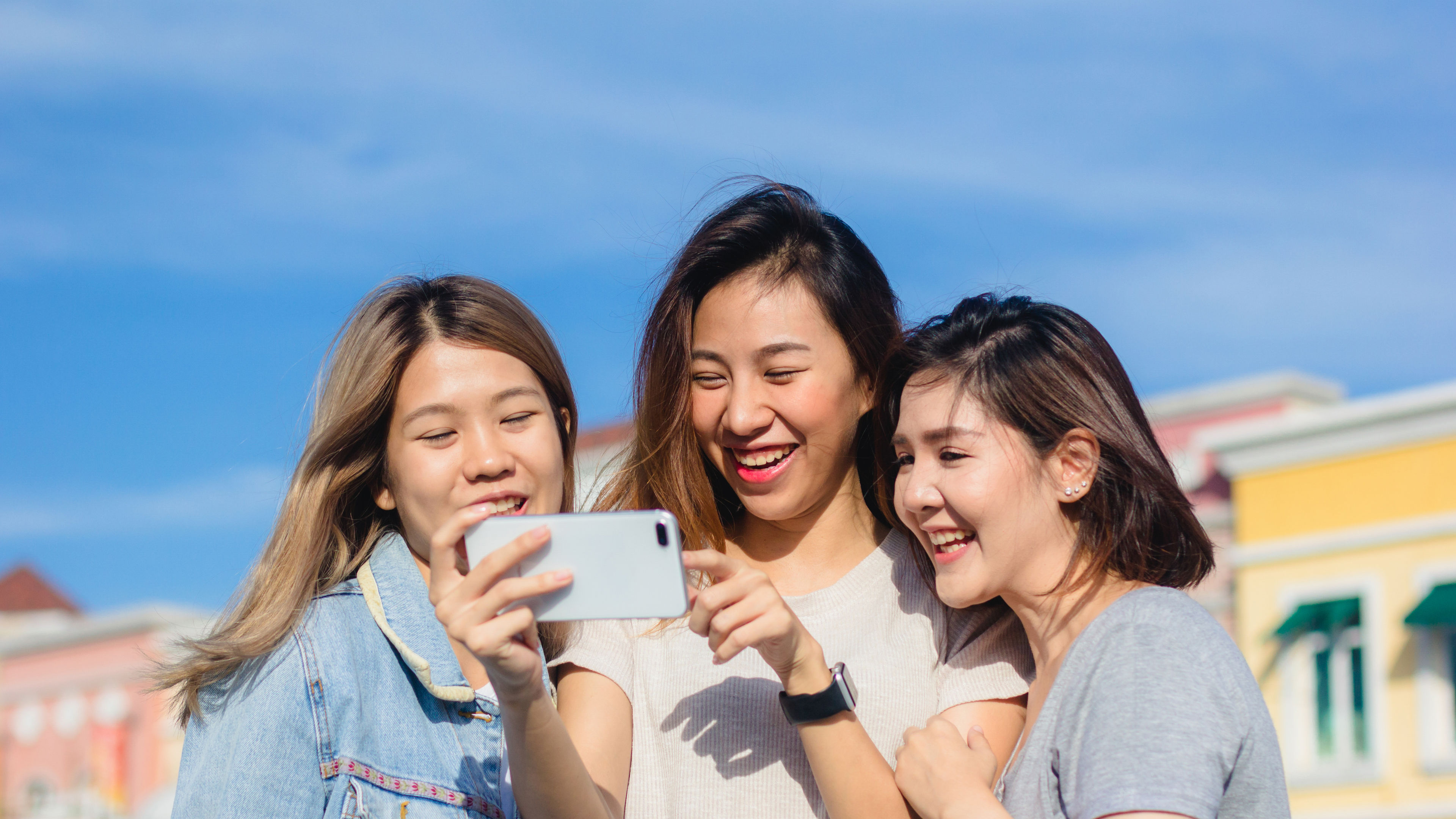 Asian friends women using a smartphone