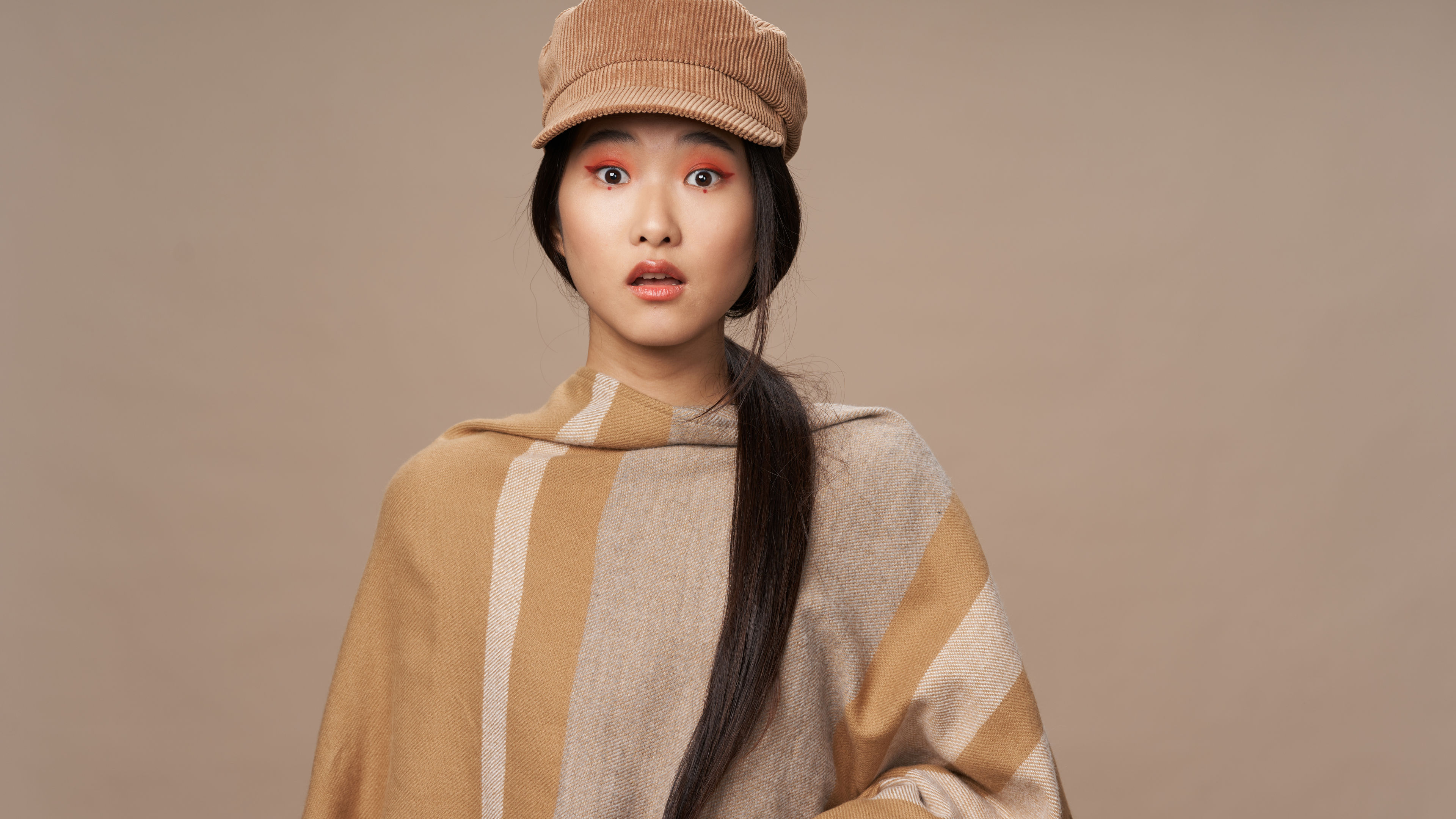 Asian inspired look with vibrant makeup