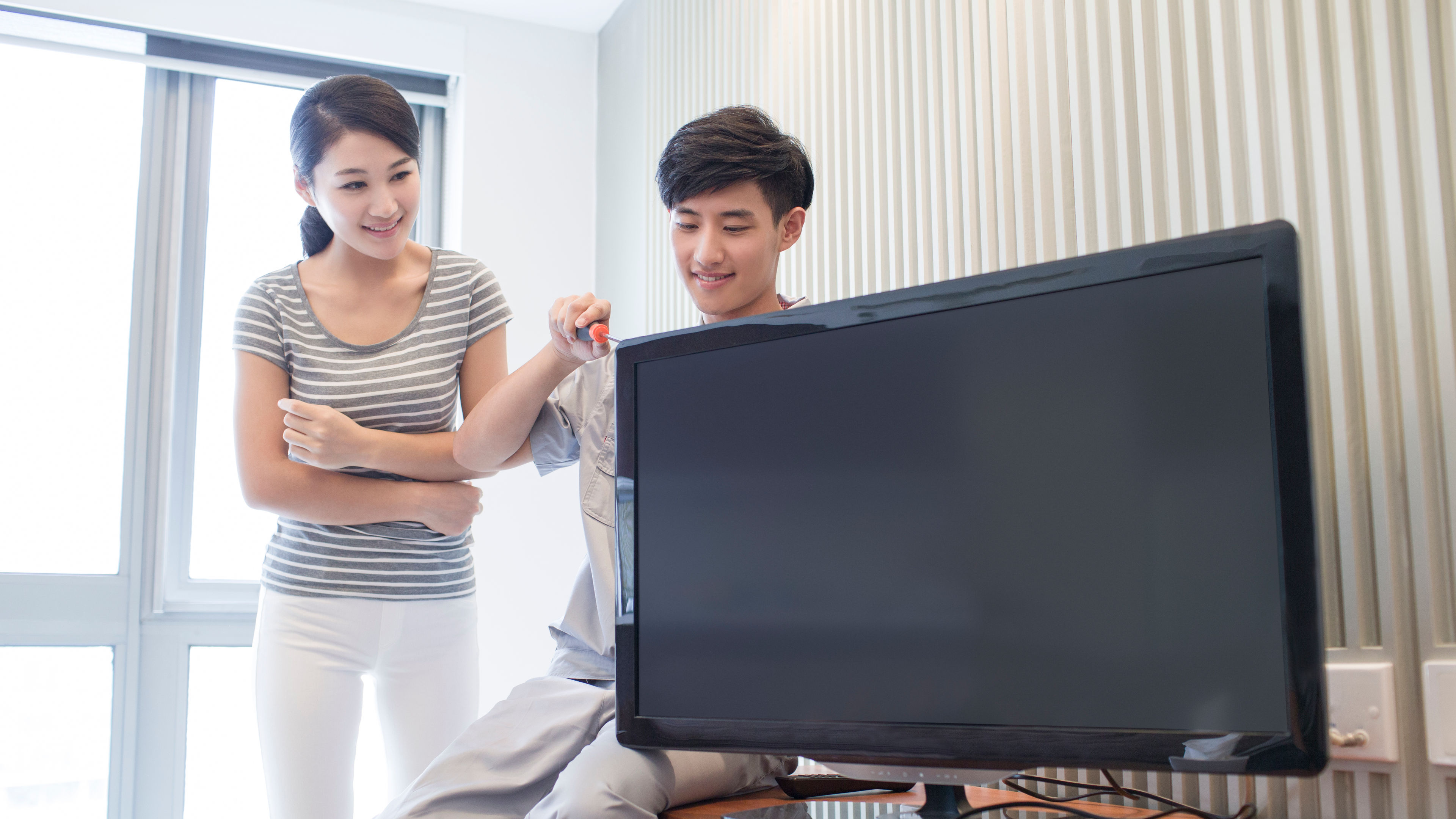 Man Checking TV