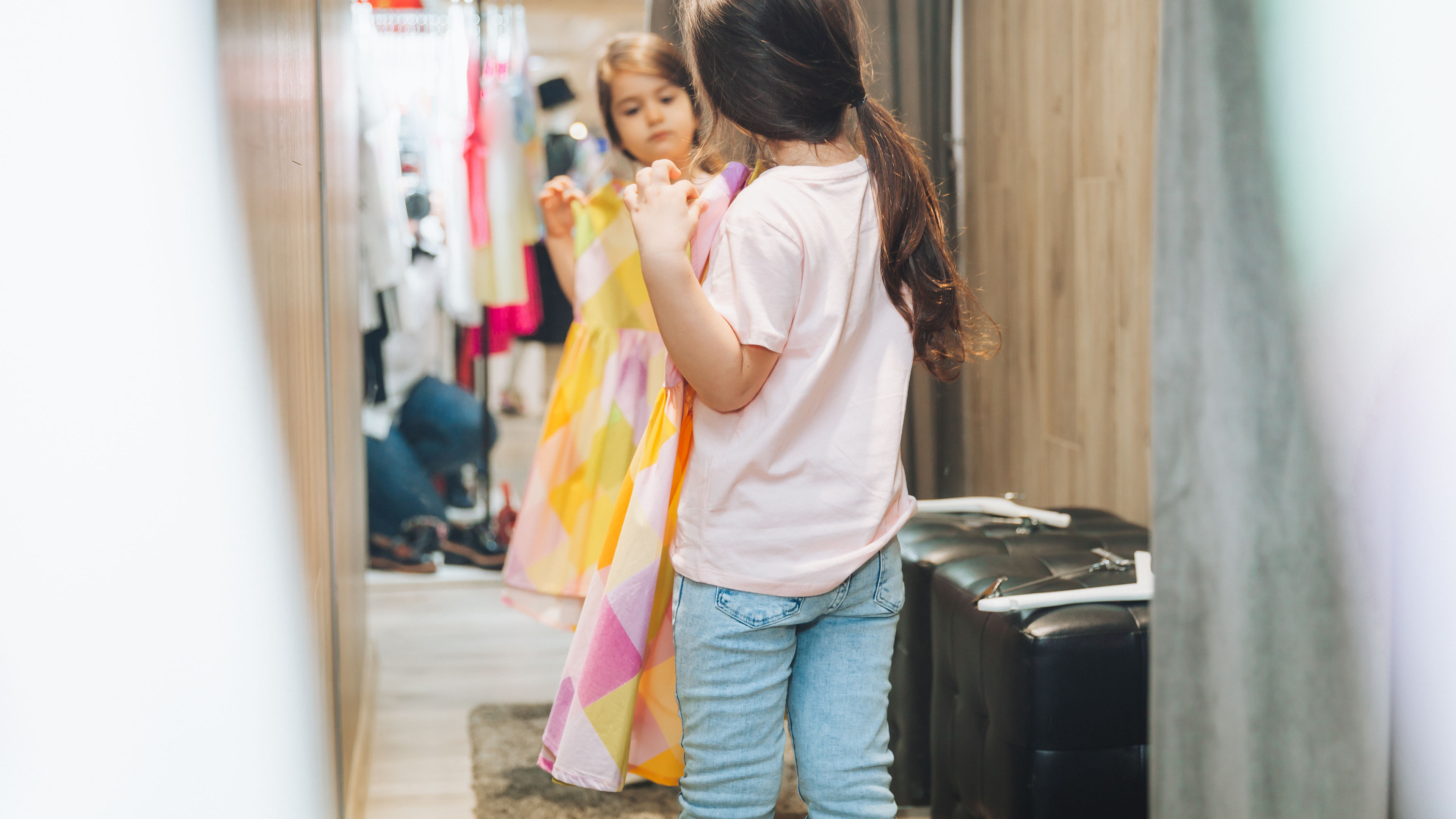 Mother and daughter buy clothes