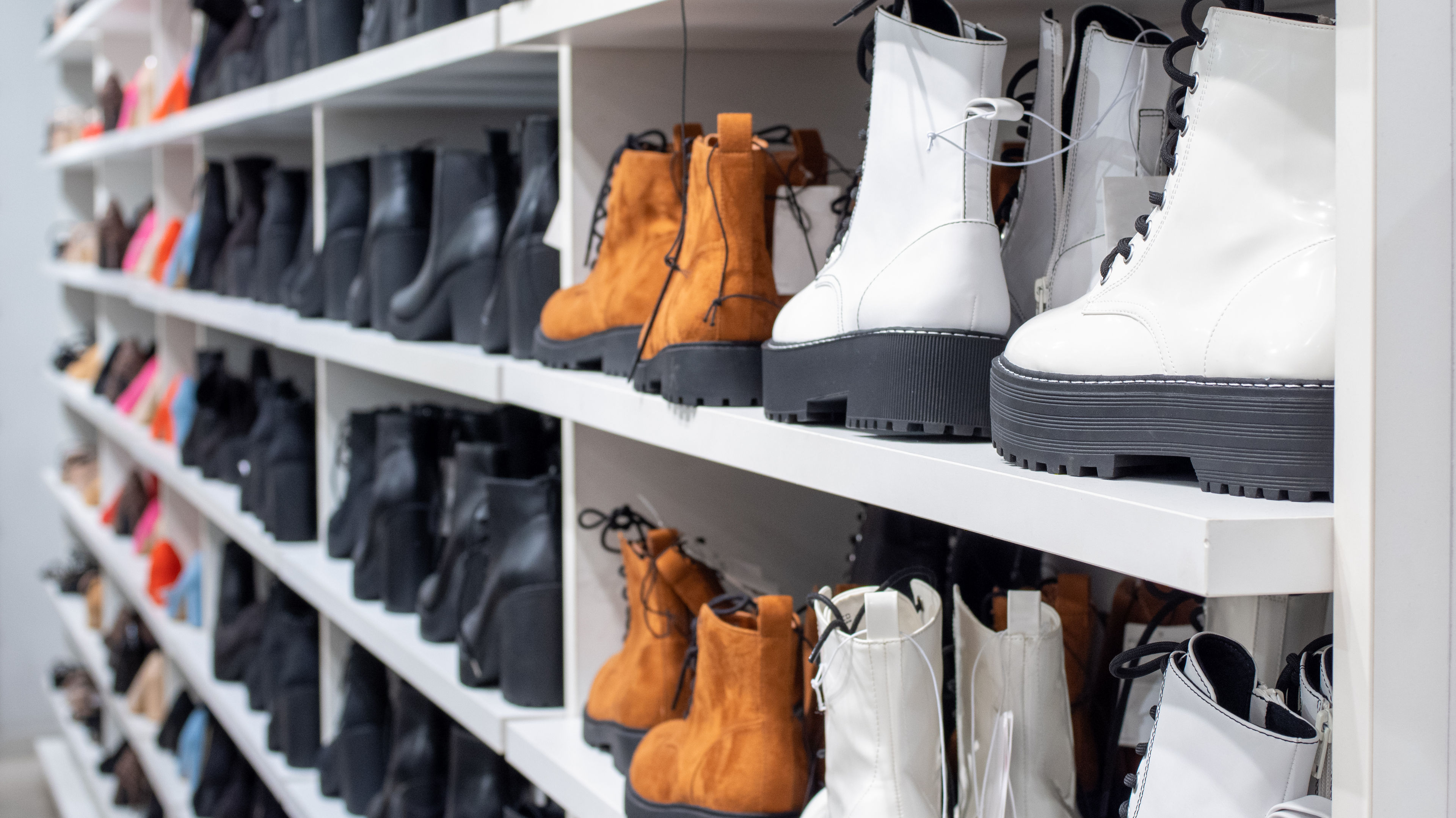  Shelves of a shoe store with many sales of women's shoes 