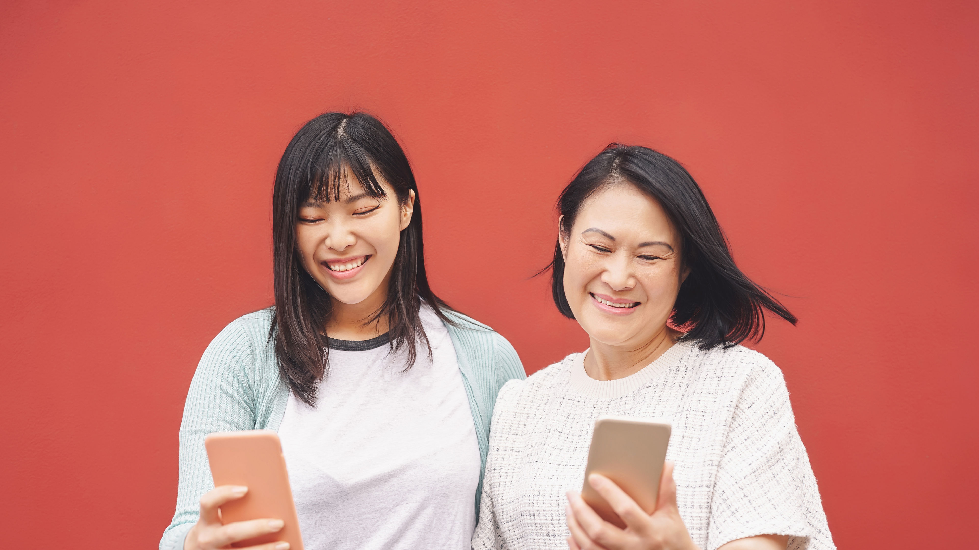 Two women with phones