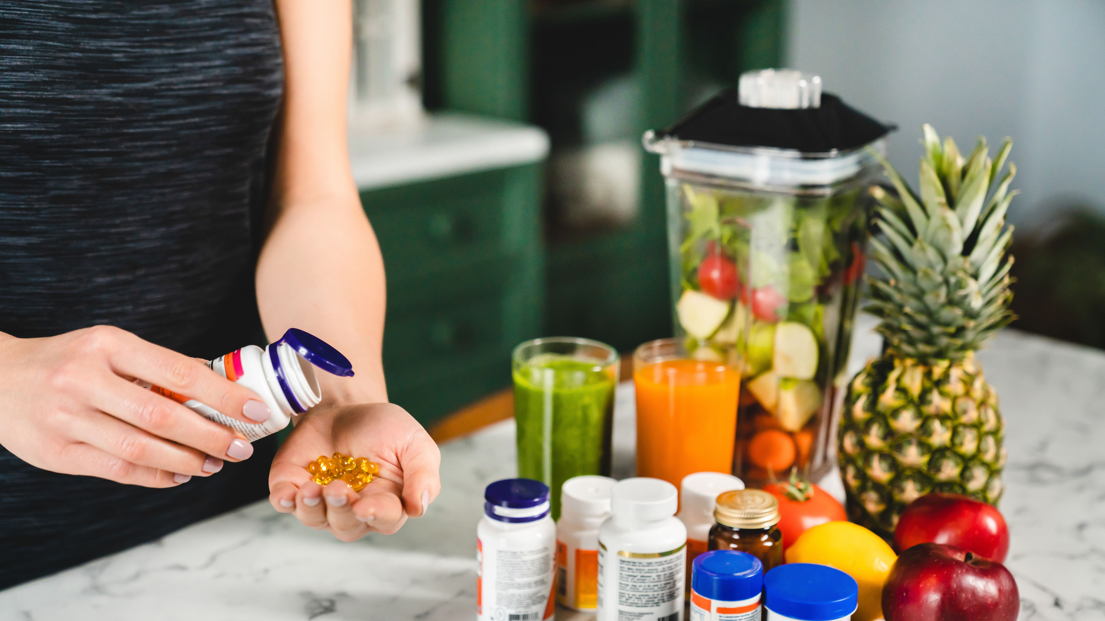 Woman taking food supplements
