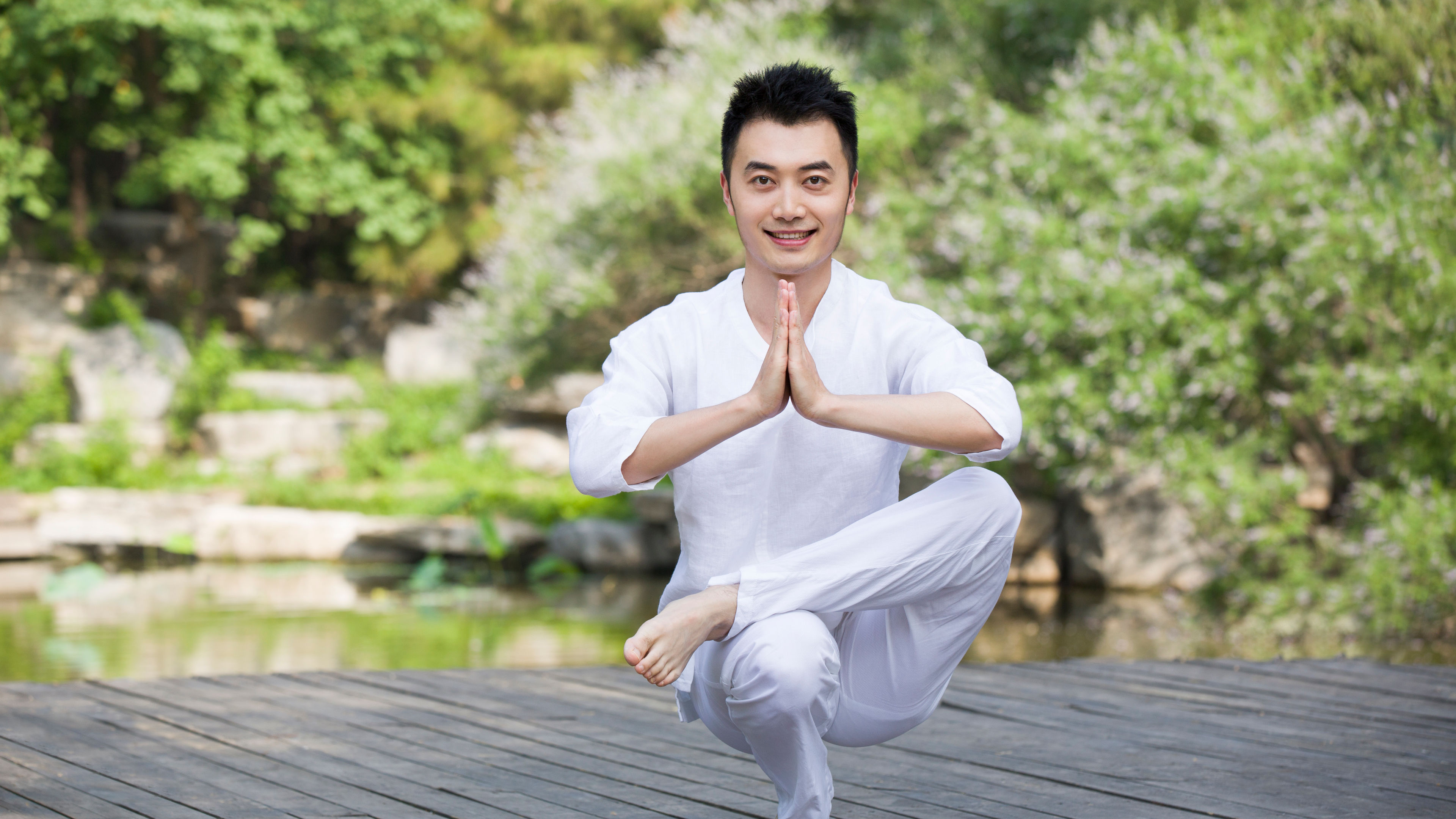 Young man practicing yoga